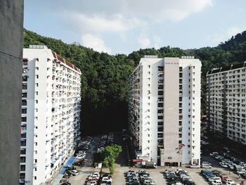 High angle view of buildings and street in city