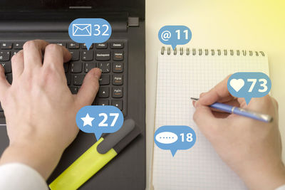 Midsection of people using smart phone