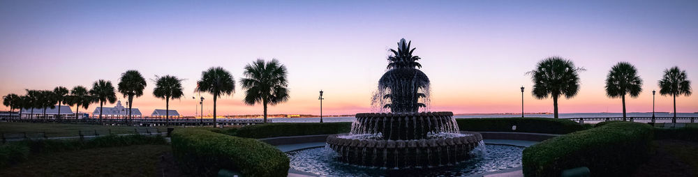 Statue of palm trees against clear sky