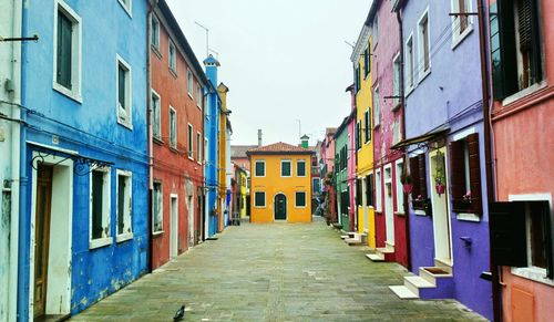 Narrow alley along buildings