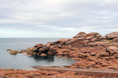 Pink granite coast near ploumanach - boulders on the cote de granit rose, brittany, france