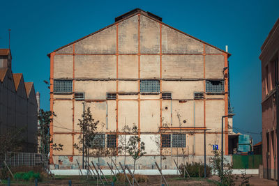 Low angle view of old building against sky