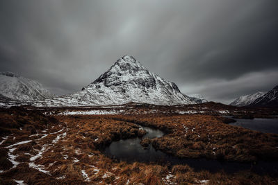 Scenic view of snowcapped mountain against sky