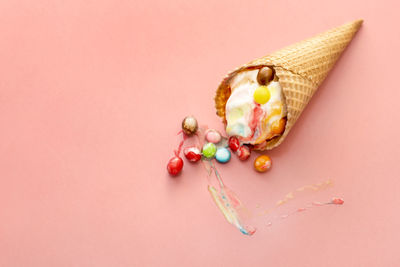 Ice cream cone on colored background