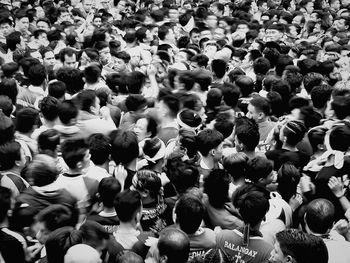 High angle view of group of people in city