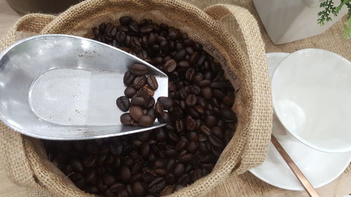 High angle view of coffee cup on table
