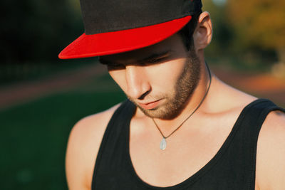 Portrait of young man wearing hat