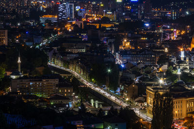 High angle view of illuminated buildings in city