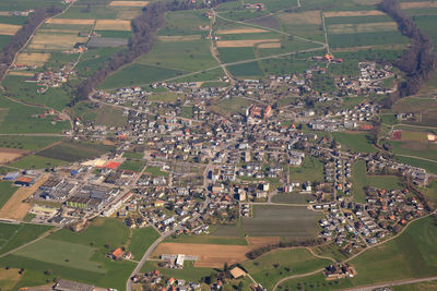 High angle view of buildings on field