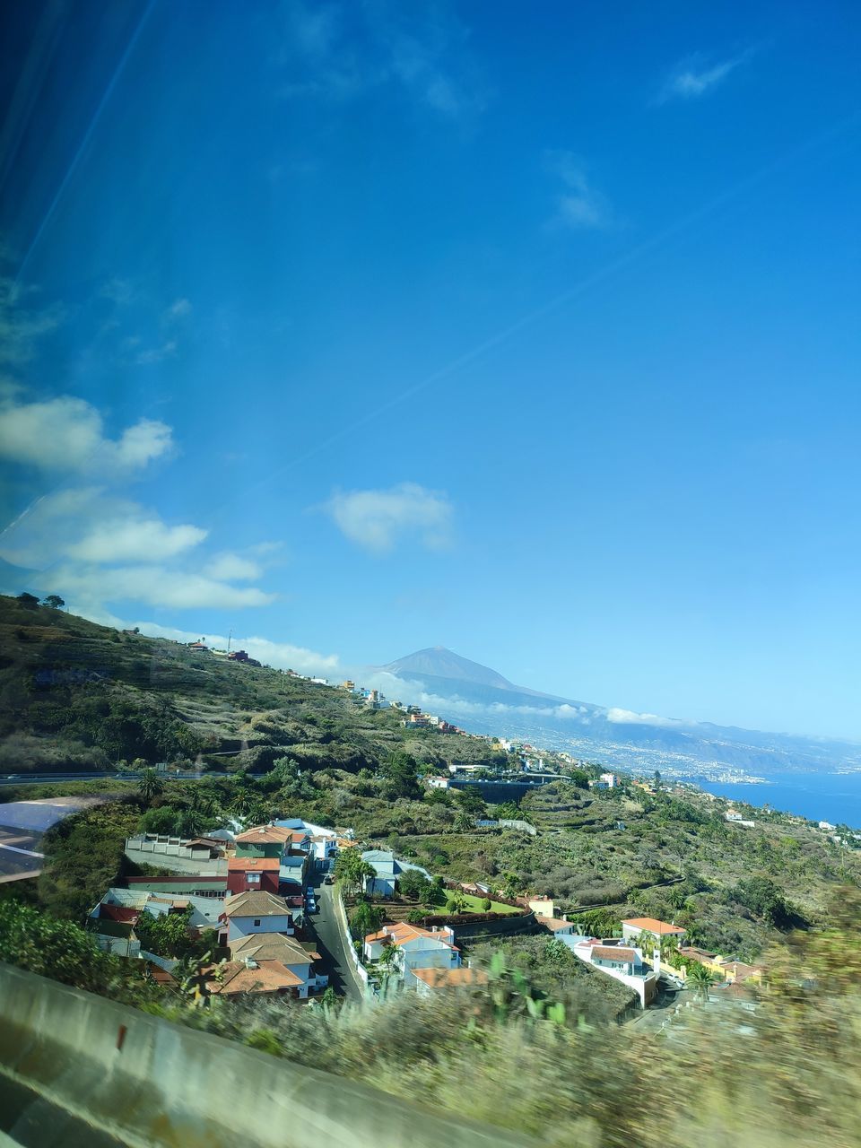 SCENIC VIEW OF SEA BY BUILDINGS AGAINST SKY