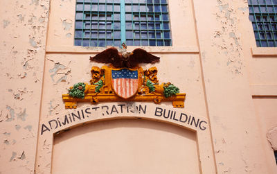 Low angle view of text on building