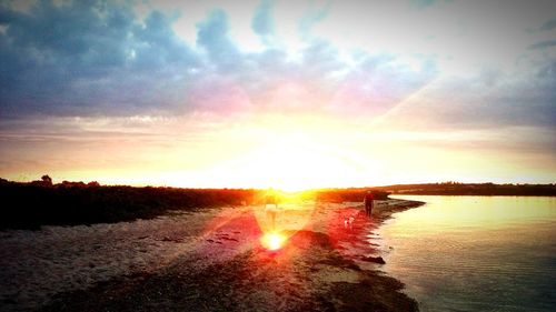 Scenic view of sunset over river