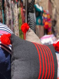 Close-up of pillows for sale at street market