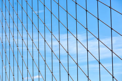 Metal fence with sky in background