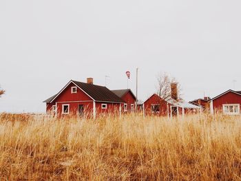 House on field against sky