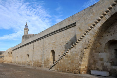 Low angle view of historical building against sky