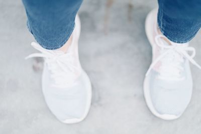 Low section of person standing on walkway