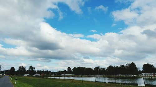 Scenic view of landscape against cloudy sky