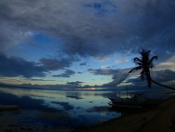 Scenic view of sea against sky at sunset