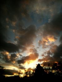 Low angle view of dramatic sky during sunset