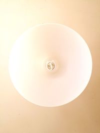 Low angle view of illuminated electric lamp