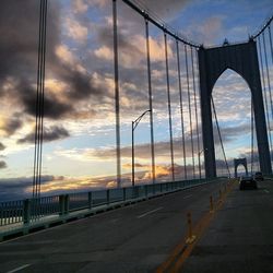 View of bridge against cloudy sky