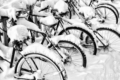 High angle view of snow on bicycles