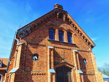 Low angle view of historic building against sky