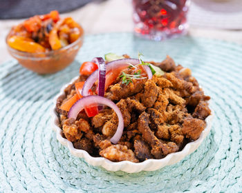 Close-up of food served on table