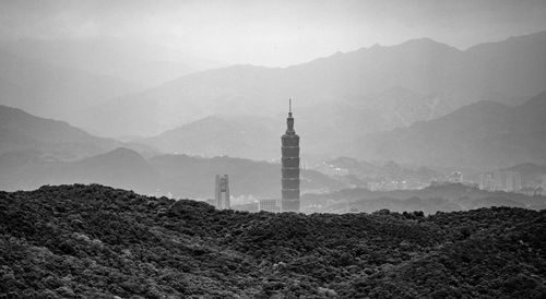 View of lighthouse on mountain against sky