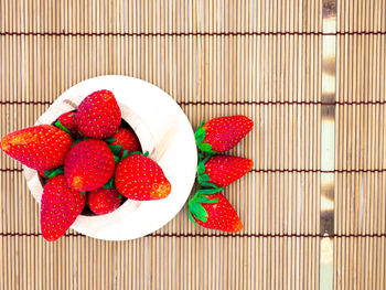 High angle view of strawberries on table