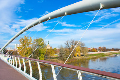 Bridge over river against sky