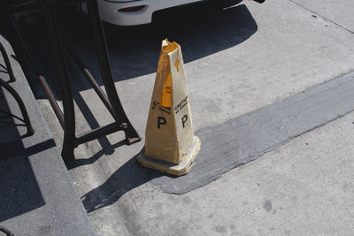 High angle view of yellow car on street