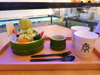 Close-up of breakfast served on table