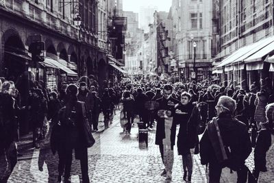 People walking on street in city