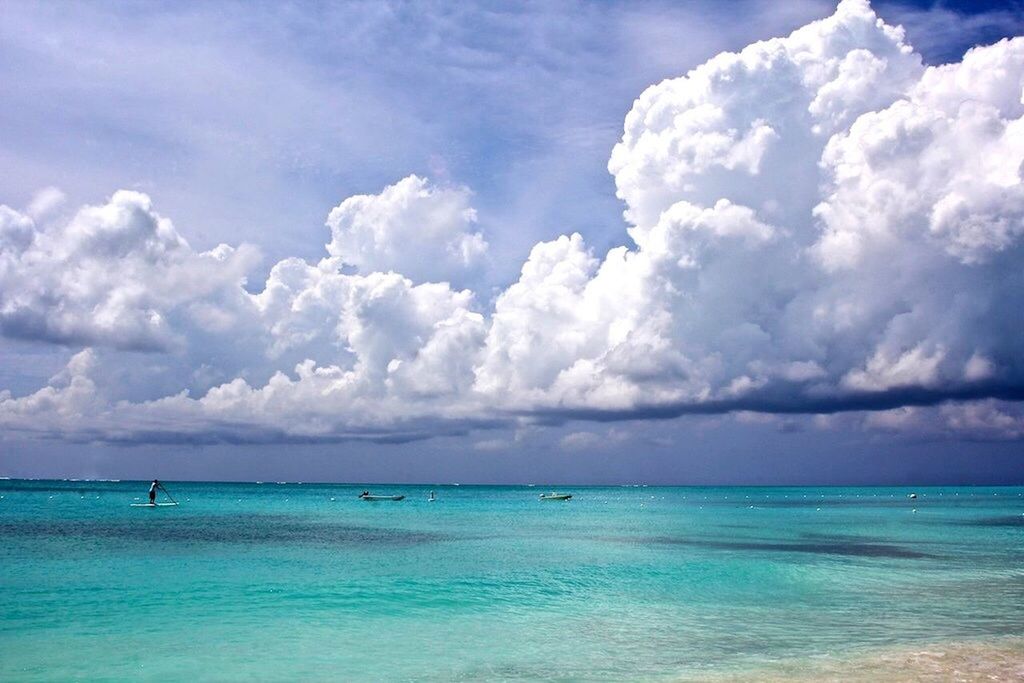 sea, horizon over water, sky, water, tranquil scene, scenics, cloud - sky, tranquility, beauty in nature, cloudy, beach, cloud, blue, nature, idyllic, waterfront, seascape, shore, day, calm