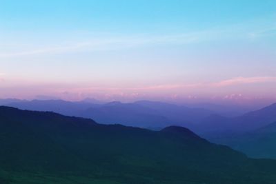 Scenic view of mountains at sunset