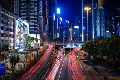 High angle view of illuminated city street at night