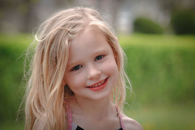 Portrait of smiling girl outdoors