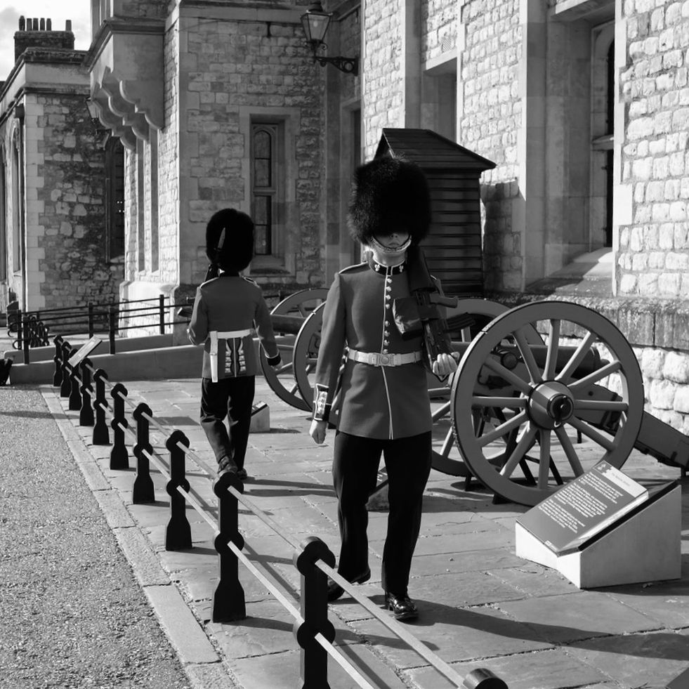 building exterior, built structure, real people, full length, architecture, day, outdoors, men, togetherness, two people, weapon, canon, city, young adult, adult, people