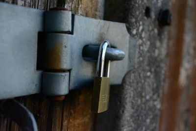 Close-up of padlock on wall