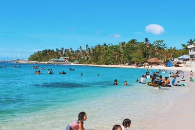 People enjoying at beach