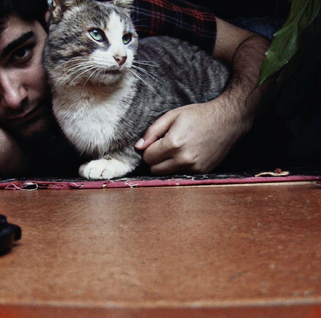 CLOSE-UP OF MAN WORKING AT HOME