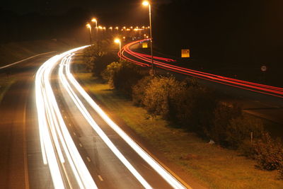 Light trails on road at night