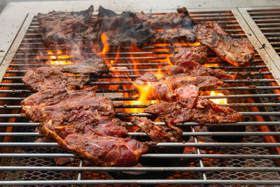 Meat on barbecue grill