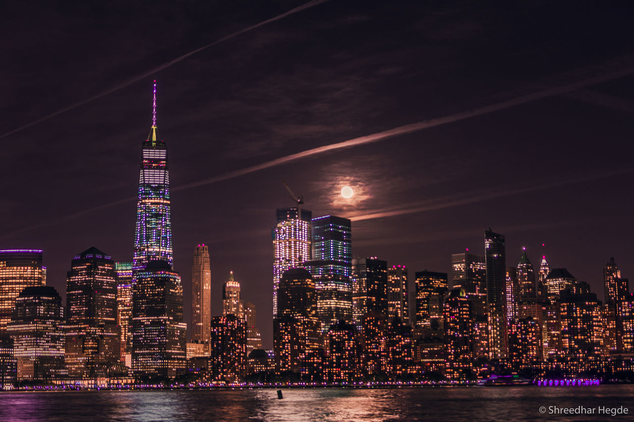 ILLUMINATED BUILDINGS AT NIGHT