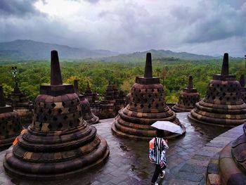 View of temple against cloudy sky