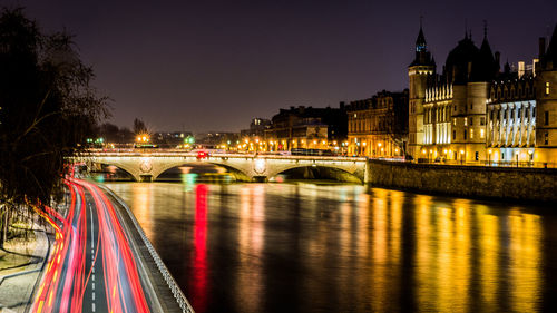 Bridge over river at night