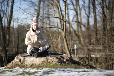 Yoga outdoor. happy woman doing yoga exercises. yoga meditation in nature. 