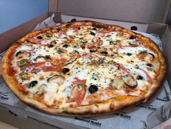 High angle view of pizza in box